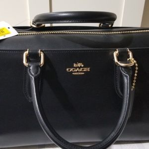 New coach purse with tags.. bought at Dillard